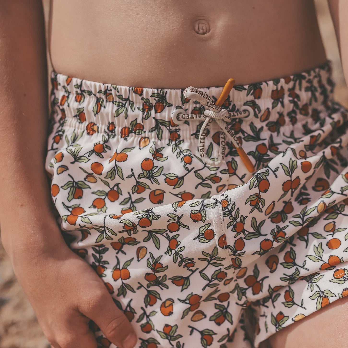 Salted Stories | Pommegranate swim shorts -white swan